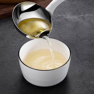 Skje med oljefilter design