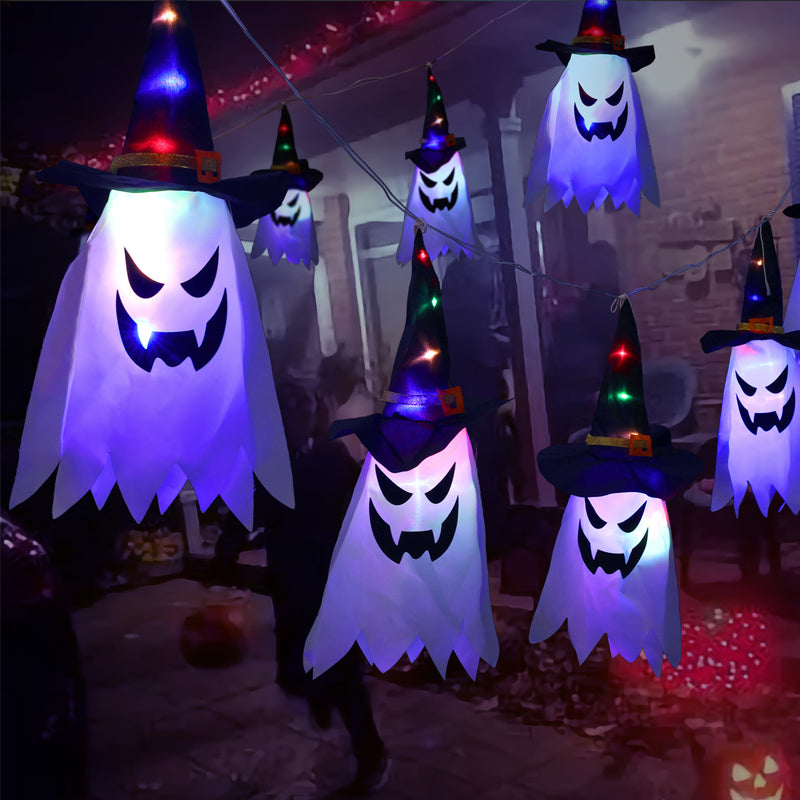 Opphengt, lysende og glødende heksehatt til halloween