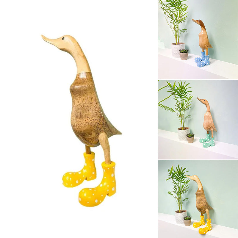 Håndskåret andeprydnad