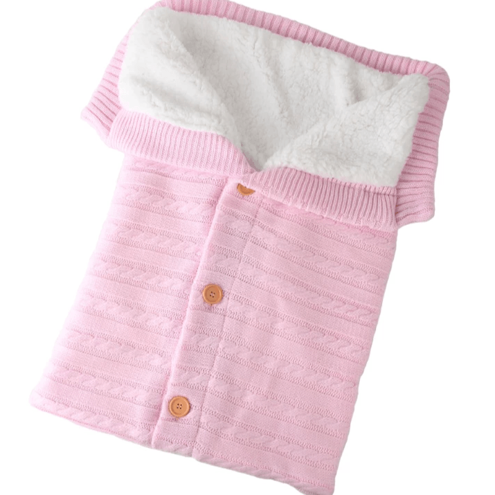 Strikket sovepose for baby med knapping foran