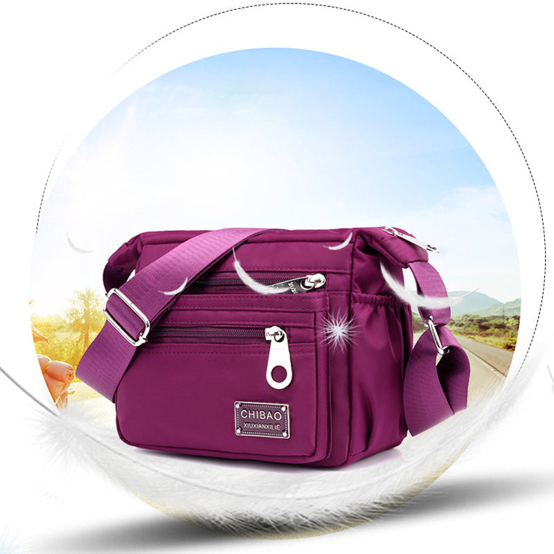 Crossbody-veske i flerlags nylon for kvinner