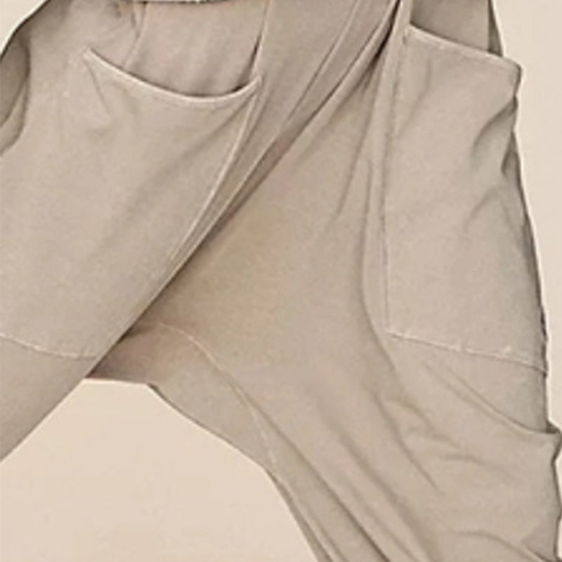Ensfarget Jumpsuit med V-hals Sling Pocket